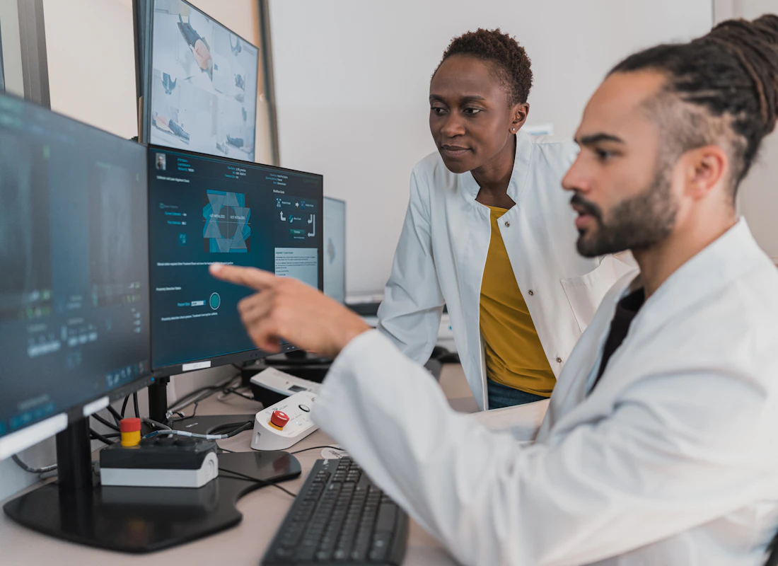 Specialist training clinic staff on new diagnostic software